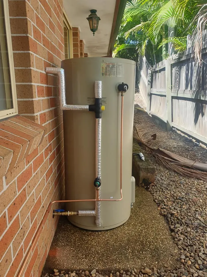 New hot water system installed against an external wall